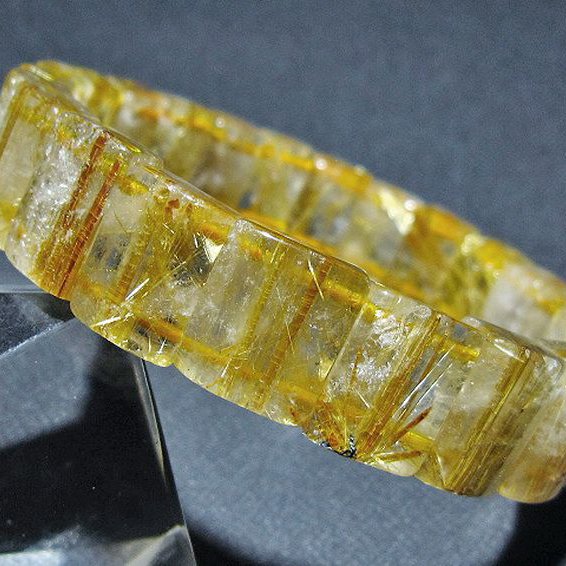 ゴールドタイチンルチル バングル [t107-4352]