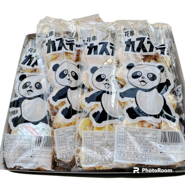 丸いカステラに砂糖がまぶしてあります