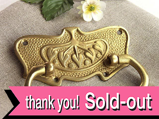 木の模様の真鍮の取っ手