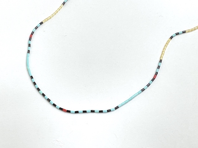 【サントドミンゴ族】フェザーチャーム付ヒシネックレス サントドミンゴ族のヒシネックレス | マライカ