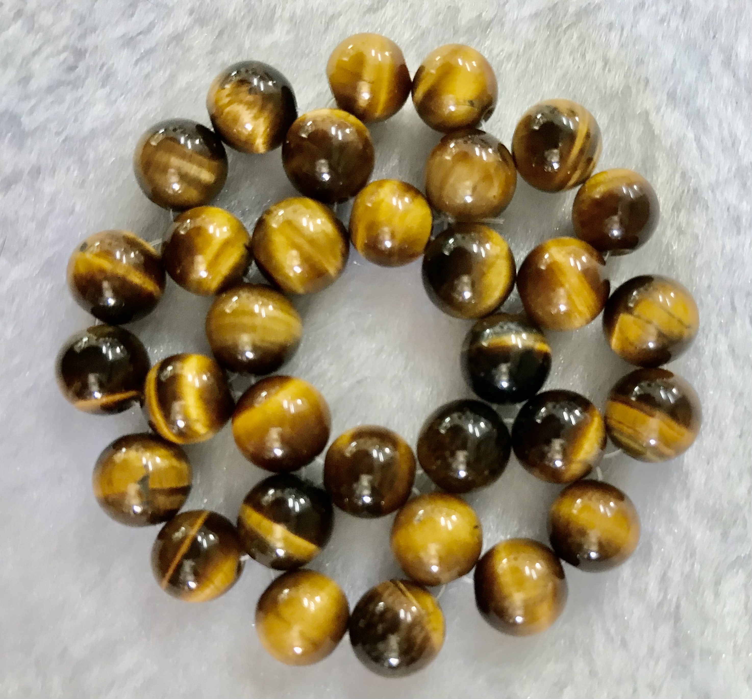 フラワーチャクラストーン （第二チャクラ・タイガーアイ）