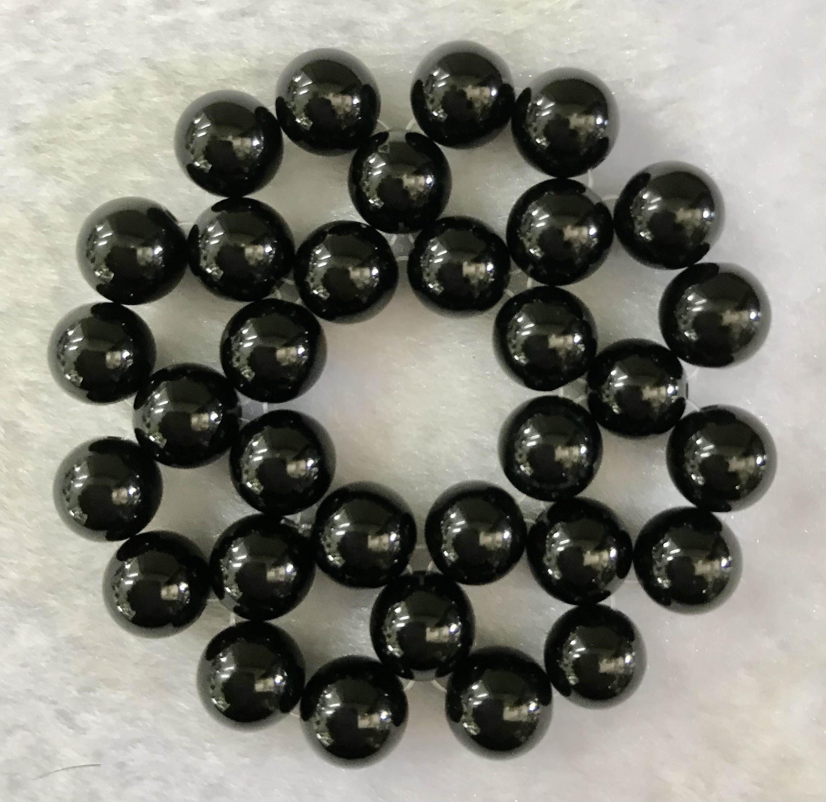 フラワーチャクラストーン （第一チャクラ・オニキス）