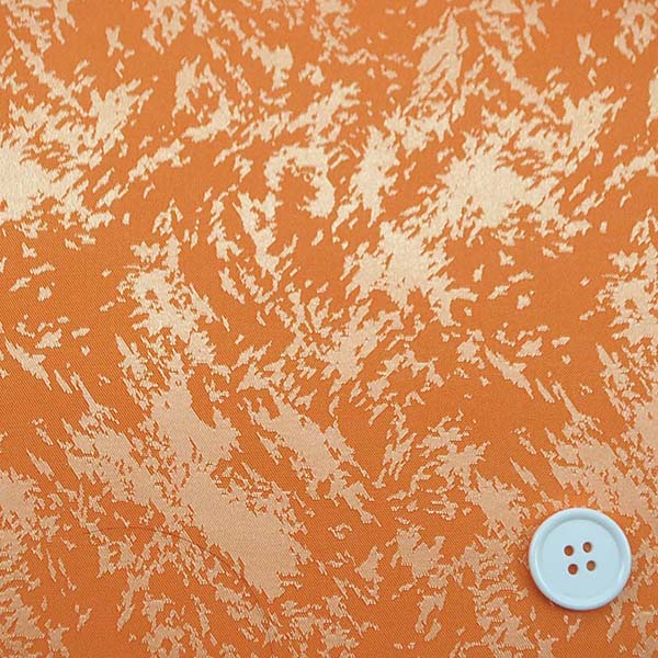 イベントや衣装に最適な光沢感のある素材　ポリエステルジャガード　フレイム（炎）　オレンジ　5613-07