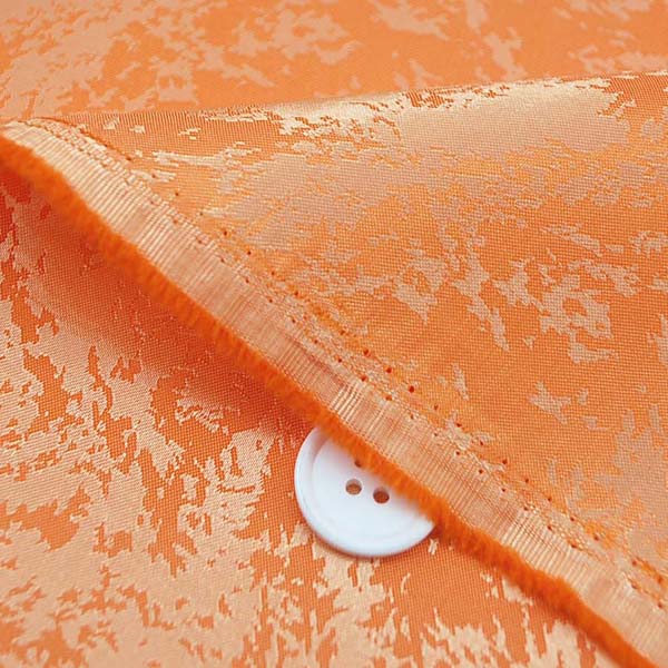 イベントや衣装に最適な光沢感のある素材　ポリエステルジャガード　フレイム（炎）　オレンジ　5613-07