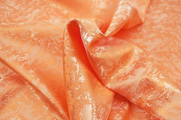 イベントや衣装に最適な光沢感のある素材　ポリエステルジャガード　フレイム（炎）　オレンジ　5613-07