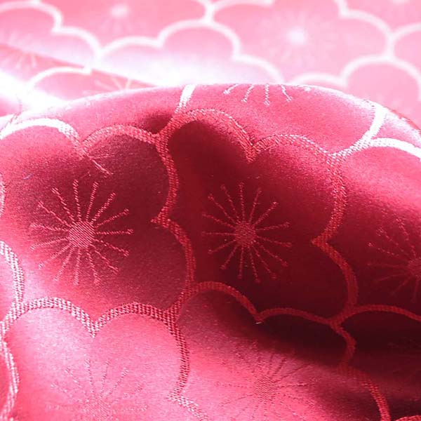 サテンジャガード　梅の柄　エンヂ（赤系）