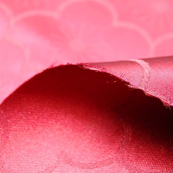 サテンジャガード　梅の柄　エンヂ（赤系）