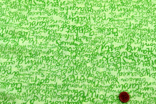 パワーネットプリント生地　英字柄　黄緑地×緑【50cm販売】（p2042）