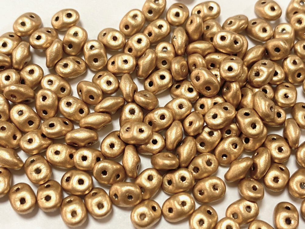 スーパーデュオビーズ　2.5x5mm （ブロンズペールゴールド/クリスタル）