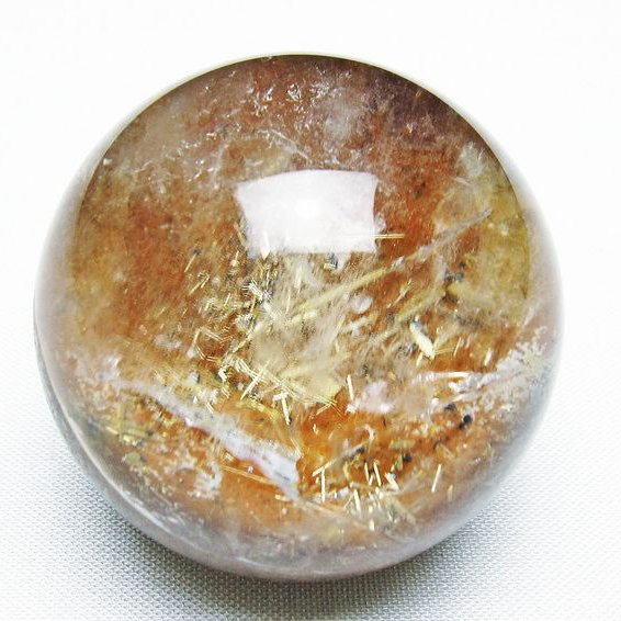 ゴールドタイチンルチル入り水晶丸玉 43mm [T637-4679]