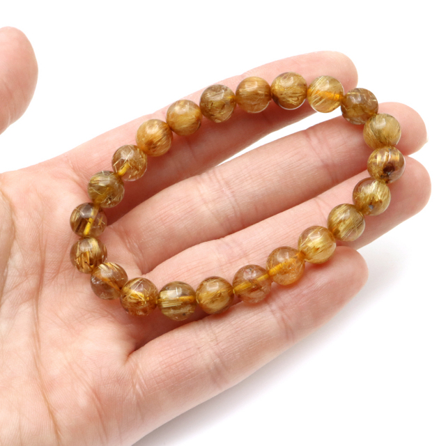 オレンジタイチンルチルクォーツ　太い針　パイライト入り　ルース　ドロップ オレンジタイチンルチルクォーツ 太い針 パイライト入り ルース