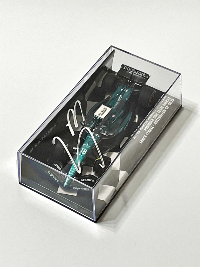 L.ストロール直筆サイン入ミニチャンプス 1/43 アストンマーティン