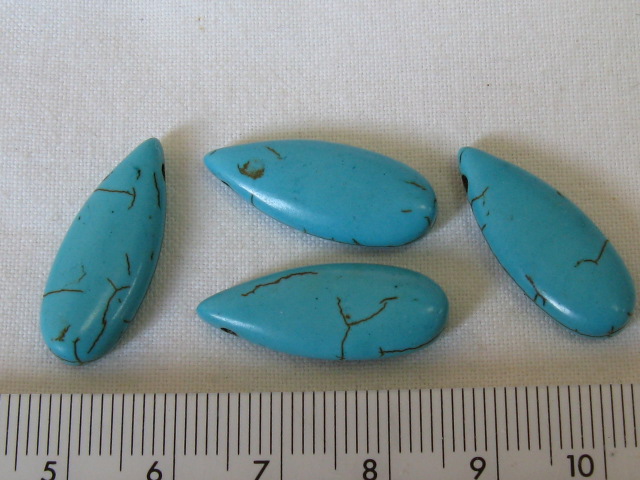 合成石　約25×10ミリ　ドロップ　練りターコイズ