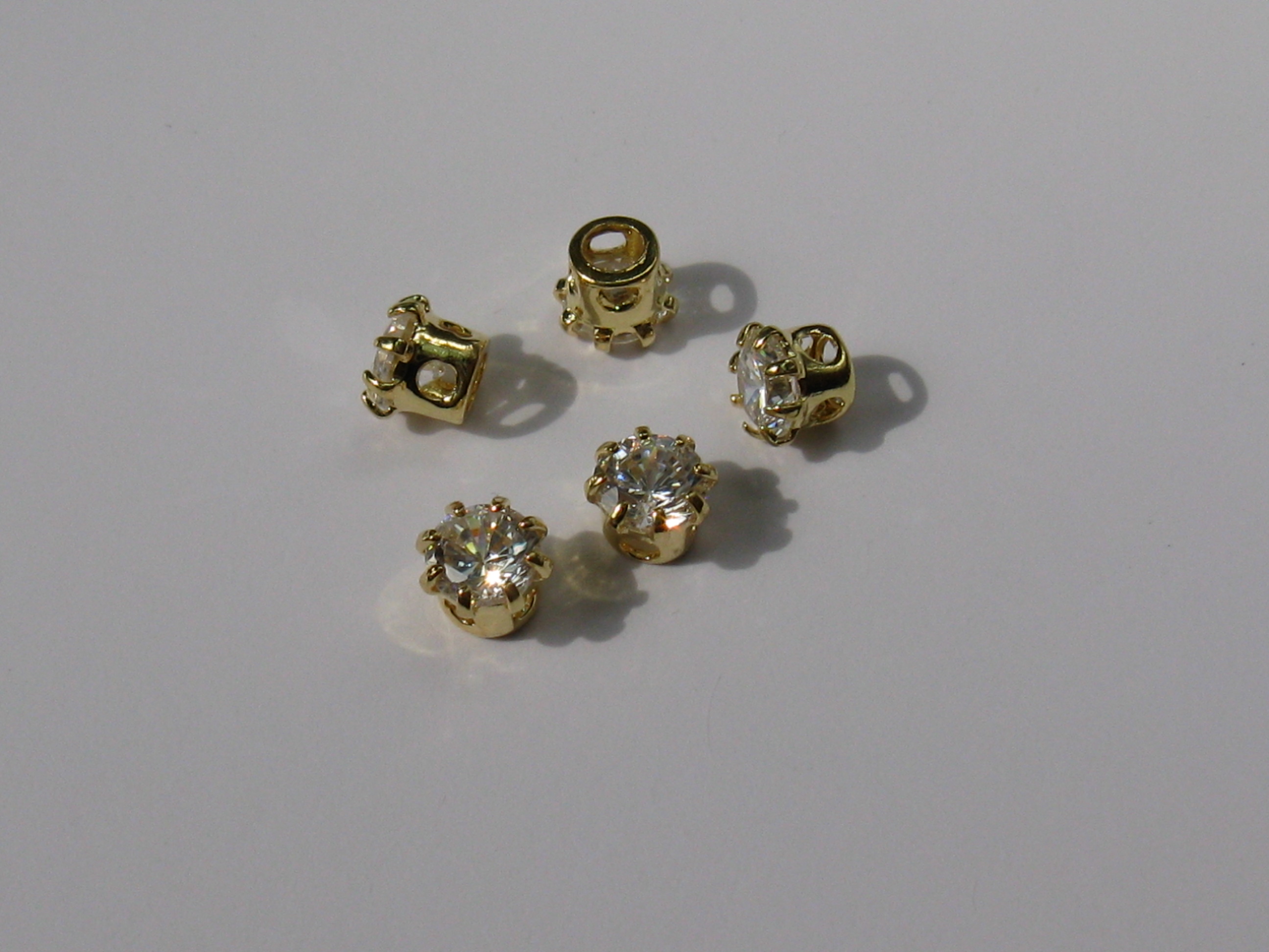 キュービック　丸型　４mm　(５個入り)　ゴールドクリスタル