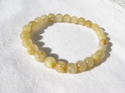 天然石ブレスレット　ラウンドタイプ　２６玉　　7.5~7.0ミリ　ルチルクォーツ