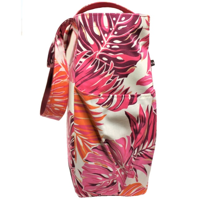 生成り地にピンク、オレンジ。えんじの大きなラウアエの葉模様がすてきなポケットいっぱいのバッグ