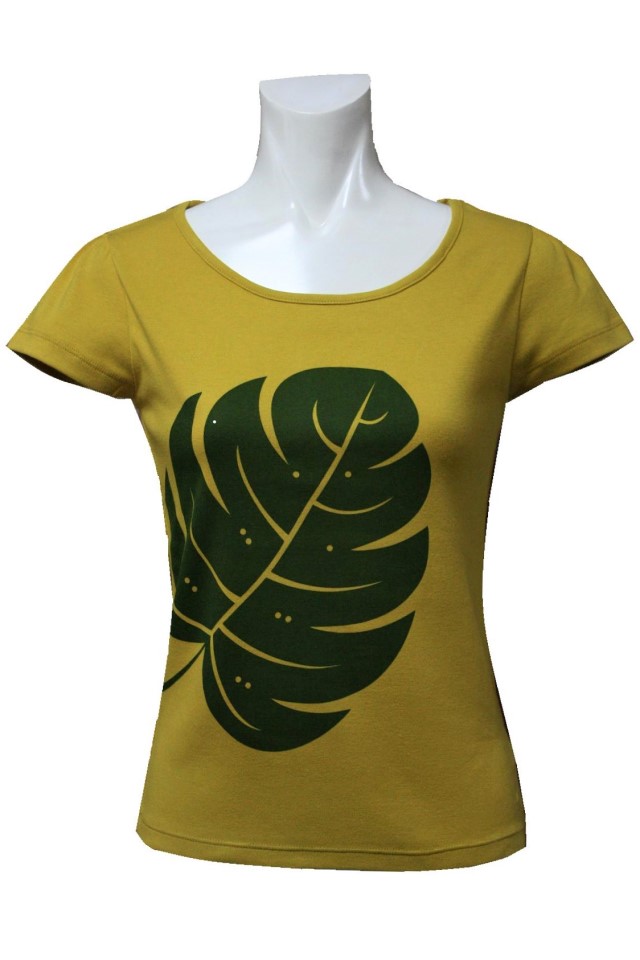 山吹色地にオリ－ブ色のモンステラ模様。