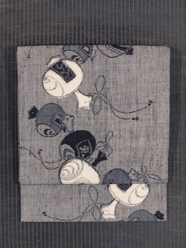 打ち出の小槌文様 絣織り 真綿紬 名古屋帯