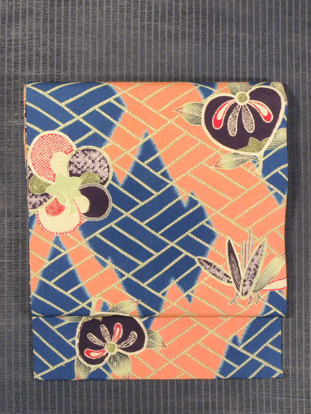 三崩しに橘とねじり梅と笹文様 型染め 名古屋帯　