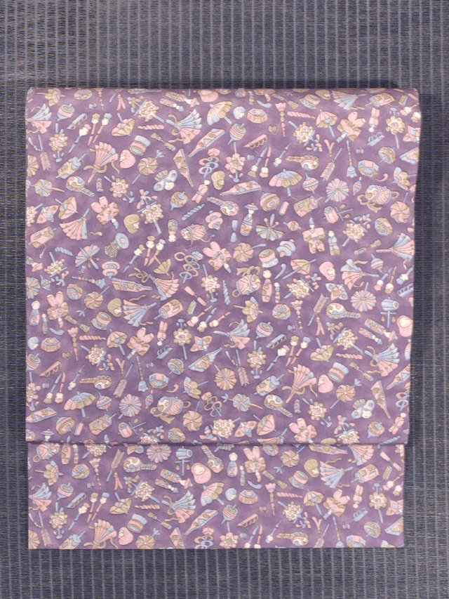 郷土人形と郷土玩具文様 型染め 名古屋帯