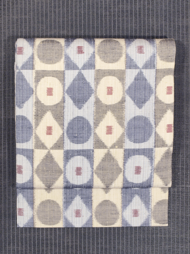 格子に丸と菱文様 絣織り 真綿紬 名古屋帯