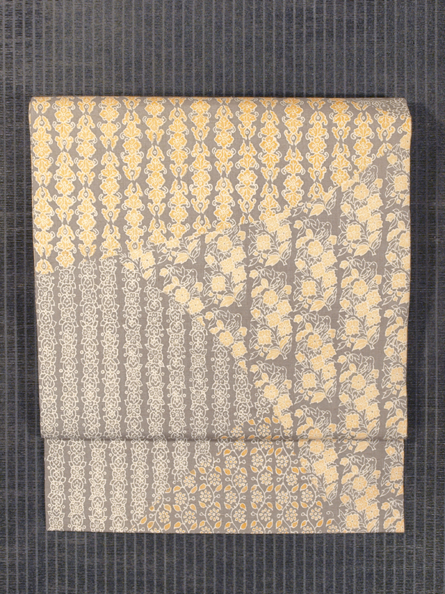 唐花草に鳥の切りばめ文様 型染め 紬 名古屋帯