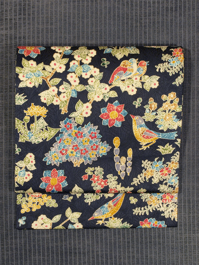 芝草の地紋に鳥と草花文様 型染め 名古屋帯