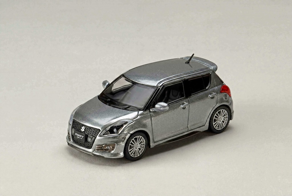 <予約 2026/10月発売予定> HJ64 1/64 スズキ スイフトスポーツ (ZC32S) 純正オプション装着車 プラチナシルバーメタリック