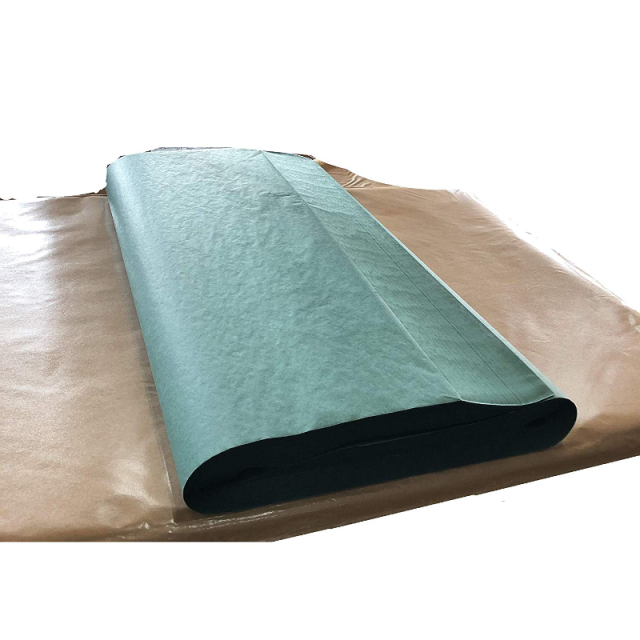 魚を包む緑の紙の全判です