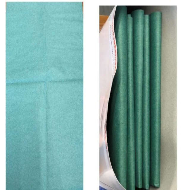 魚を包む緑の耐水紙