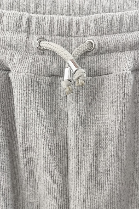 柔らかなリブ素材のフレアパンツ 2WAY仕様で脚長効果