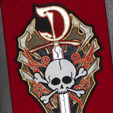 額装髑髏剣モチーフ