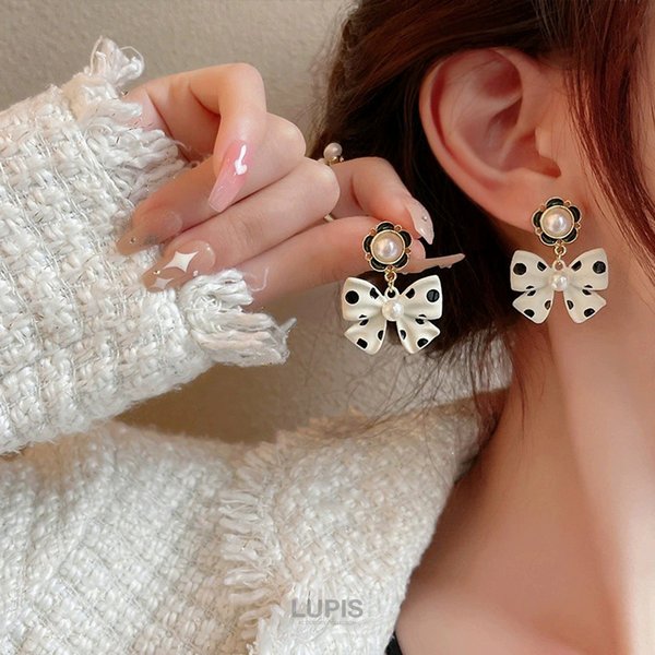 ドット柄リボンピアス - ヘアアクセサリーを激安で通販販売 | プチプラ