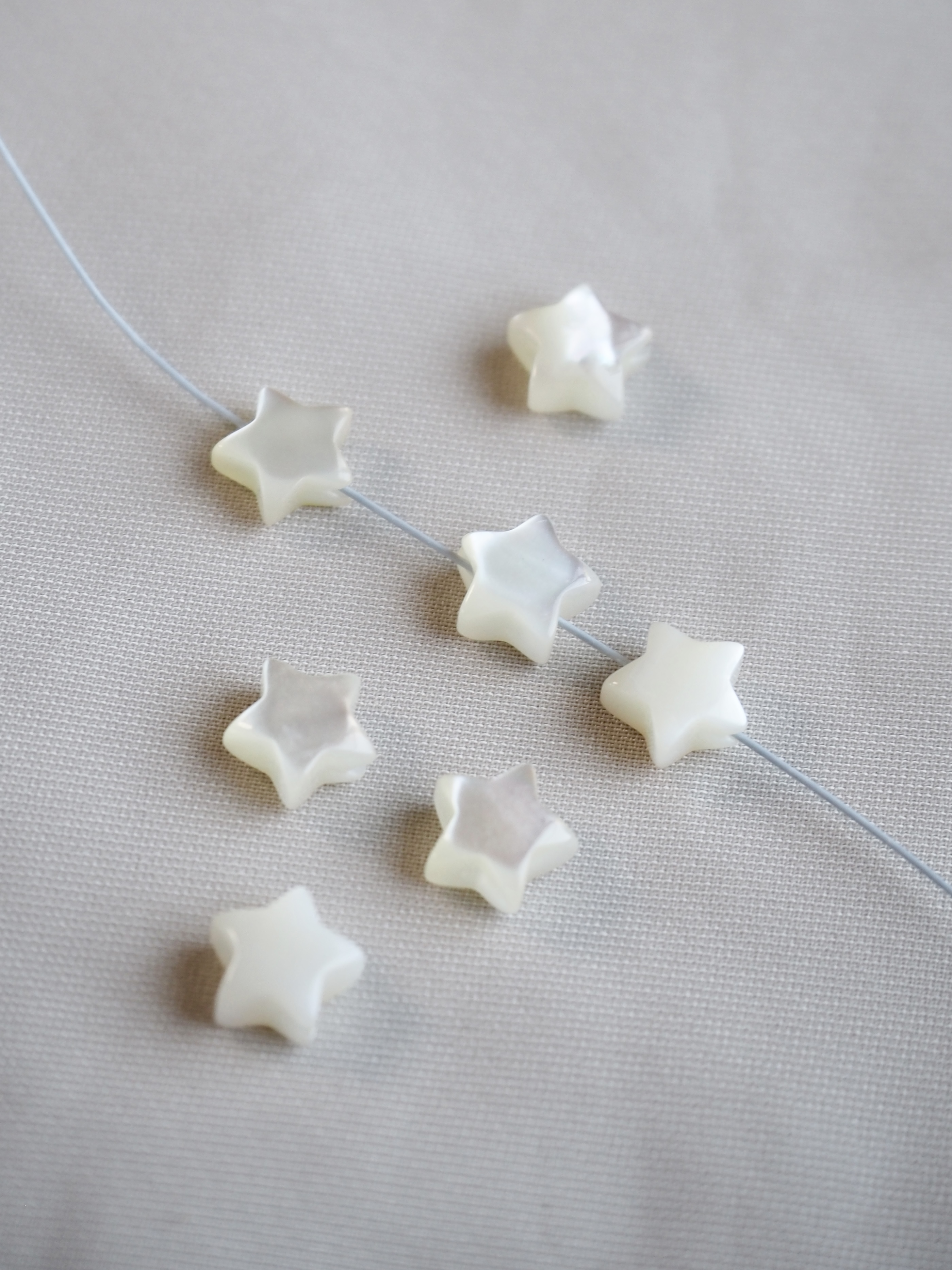 シェルビーズ-スター 横穴 ホワイト6mm(シロチョウガイ)【約6mm/1個】[メール便可]まとめ買い10%OFF #1216 En:Shell Beads -White MOP 貝殻