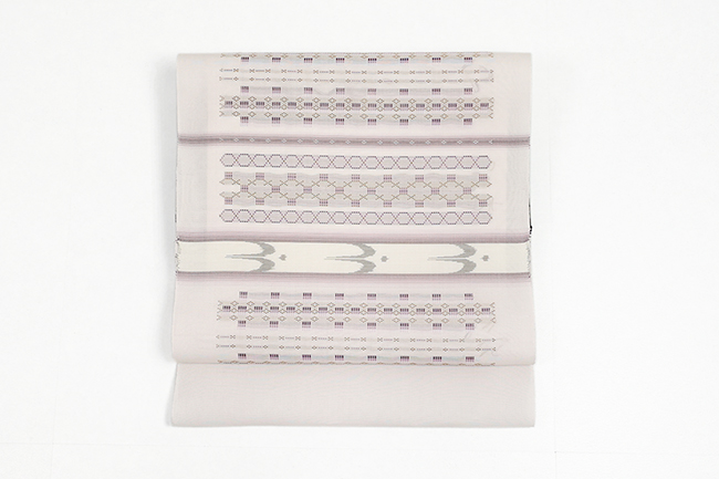 伝統的工芸品 本場琉球 南風原 花織 絹 九寸名古屋帯 琉球文様 薄ピンク