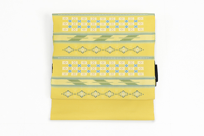 伝統的工芸品 本場琉球 南風原 花織 絹 九寸名古屋帯 琉球文様 黄色