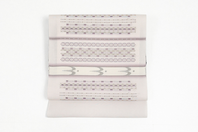 伝統的工芸品 本場琉球 南風原 花織 絹 九寸名古屋帯 琉球文様 薄ピンク