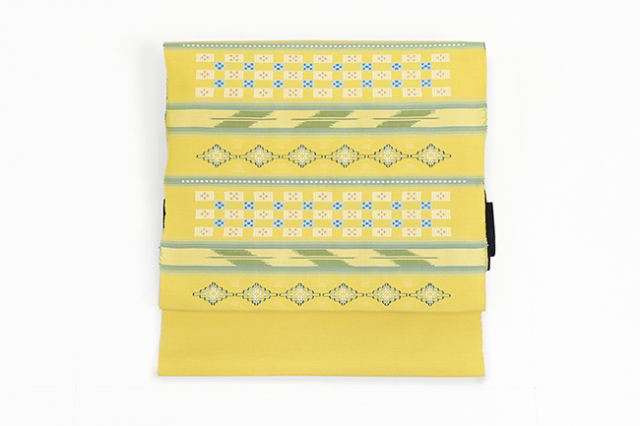 伝統的工芸品 本場琉球 南風原 花織 絹 九寸名古屋帯 琉球文様 黄色