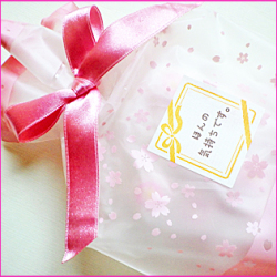 桜　配る　お菓子。