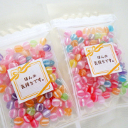 花星 ほんの気持ちですシール付き チャック袋入り 65g　ストライプ柄　