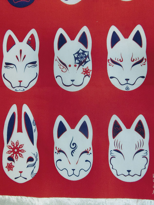 だいきょ屋のお面を沢山飾った気分になれる手拭い