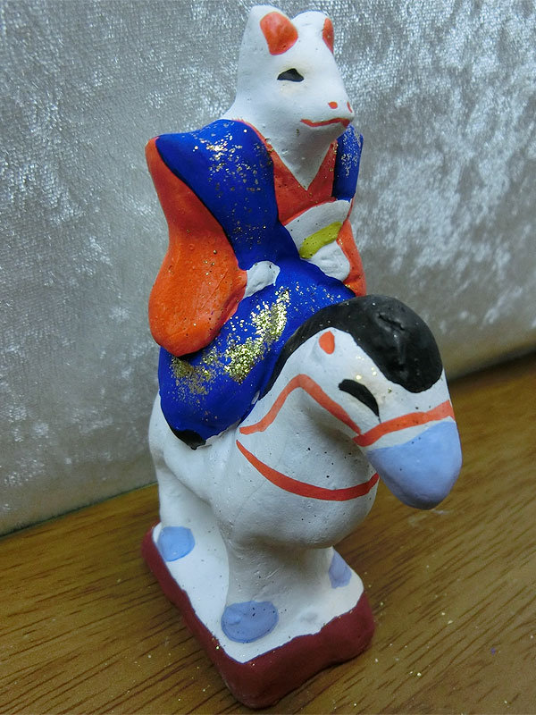 騎乗狐人形