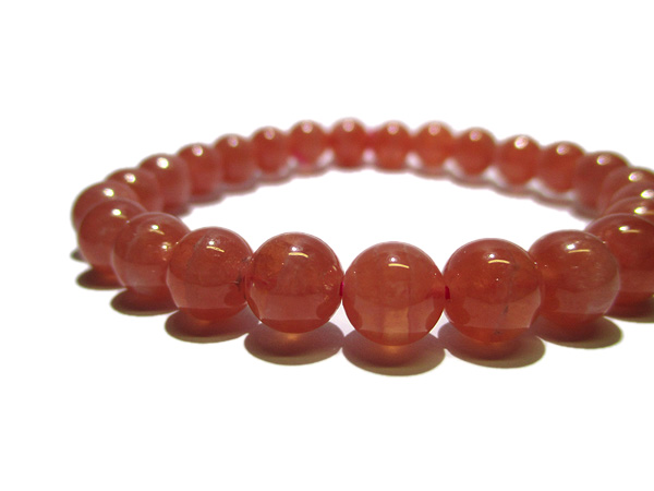 オレンジカルセドニーインカローズ天然石パワーストーンブレスレットの  