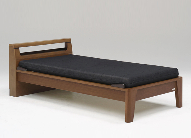 ブラウンのベッドの写真