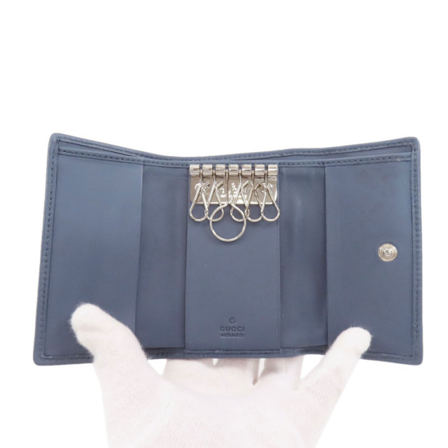 グッチ 二つ折り財布（小銭入れあり） GGシグネチャー シマ