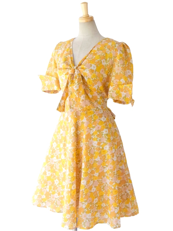 ヨーロッパ古着 ロンドン買い付け 60年代製 オレンジを基調としたきれいな色身の花柄 リボンタイ ヴィンテージ ワンピース 15BS208