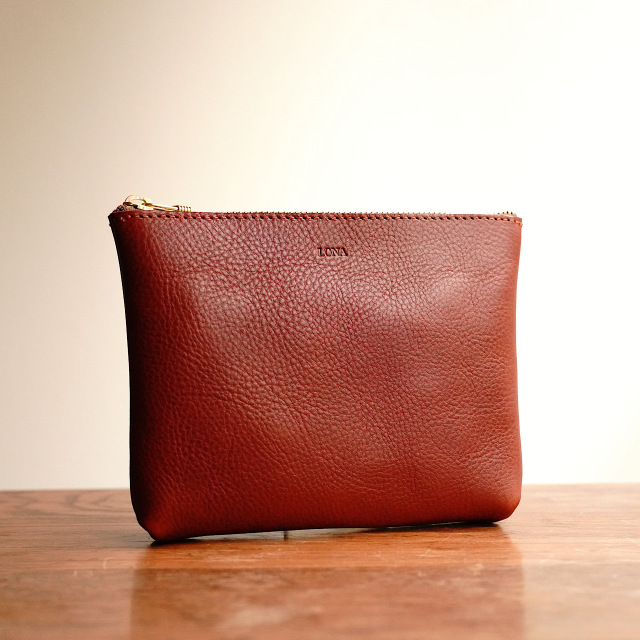 Sleek pouch terracotta brown