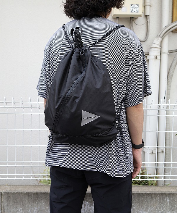アンドワンダー /and wander   crispy rip drawstrung bag