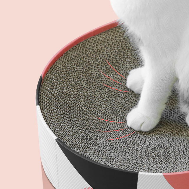猫用 爪とぎダンボールベッド ソファ 楕円形 HEBENA 爪磨きイメージ