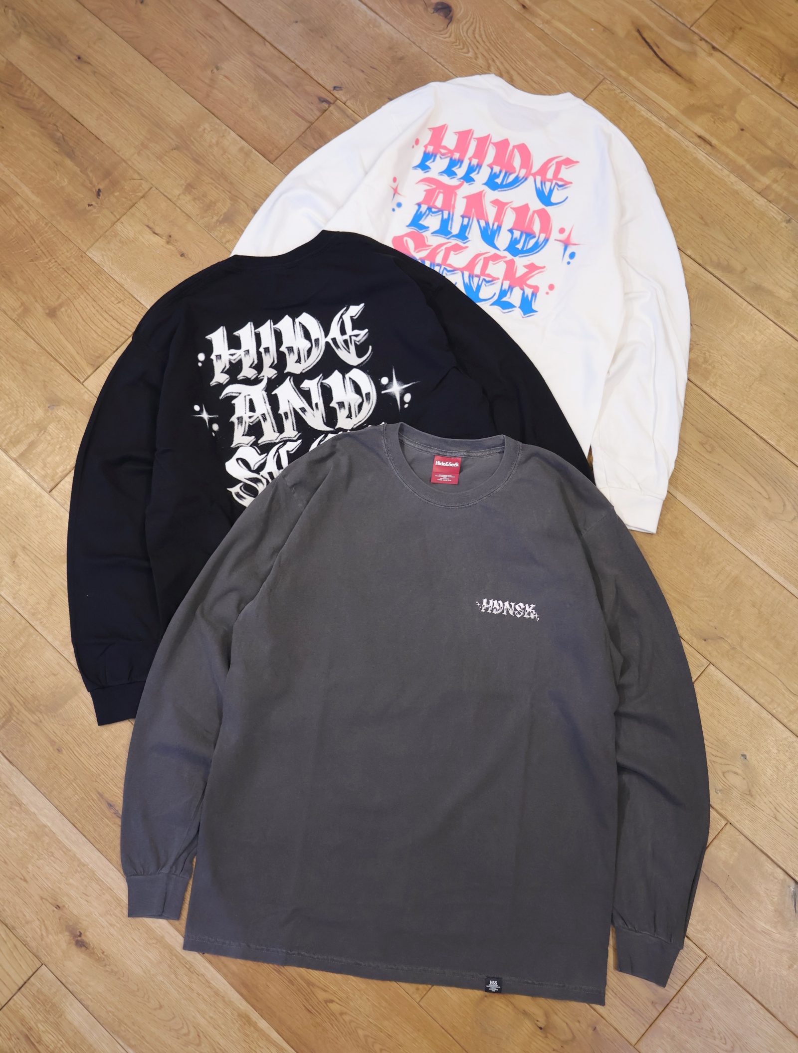 Hide and Seek　「N.L.U L/S Tee」　　プリントロングスリーブティーシャツ